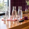 Eaux pétillantes les moins salées : comment choisir les bulles les plus légères en sel pour le café professionnel